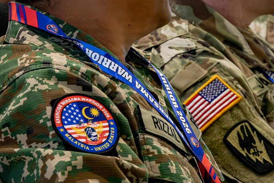A morale patch fastened to a military service member’s shoulder.